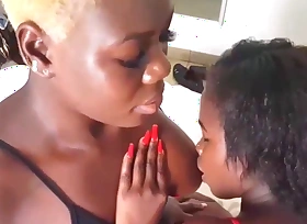 French African Sapphic Sucks Heavy Natural Tits