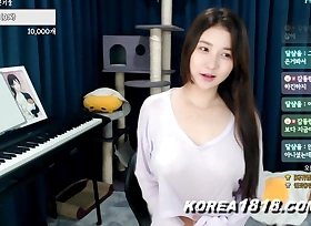 Busty sexy Korean Babe shows off tits by accident!