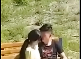 Oriental couple filmed with chum around with annoy public park