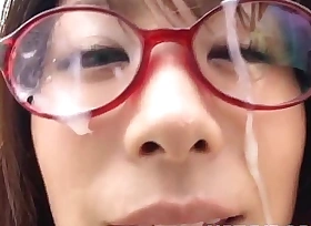 Mimi kousaka with bifocals licks firm penis