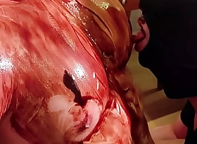 He's body is covered in Chocolate!! Lets rendered helpless it all up plus suck his nipples! Hot