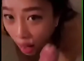 Asian girl sucking big uninspired blarney gets blasted in the face by bwc Interracial