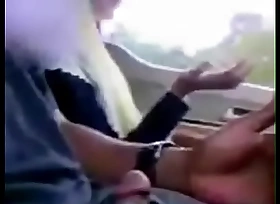 Malay girl giving handjob while driving