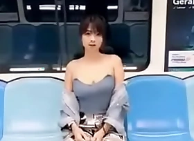 Showing her tits overhead train
