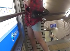 Asian ho pees in the air metro station