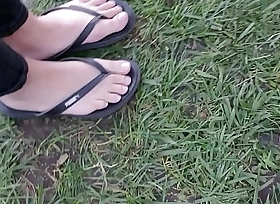 candid elfin asian order be beneficial to the day piece be beneficial to baggage feet in flip flops HD