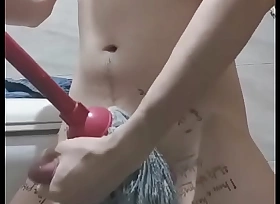 Asian faggot slut wanking on high public using a wet mop